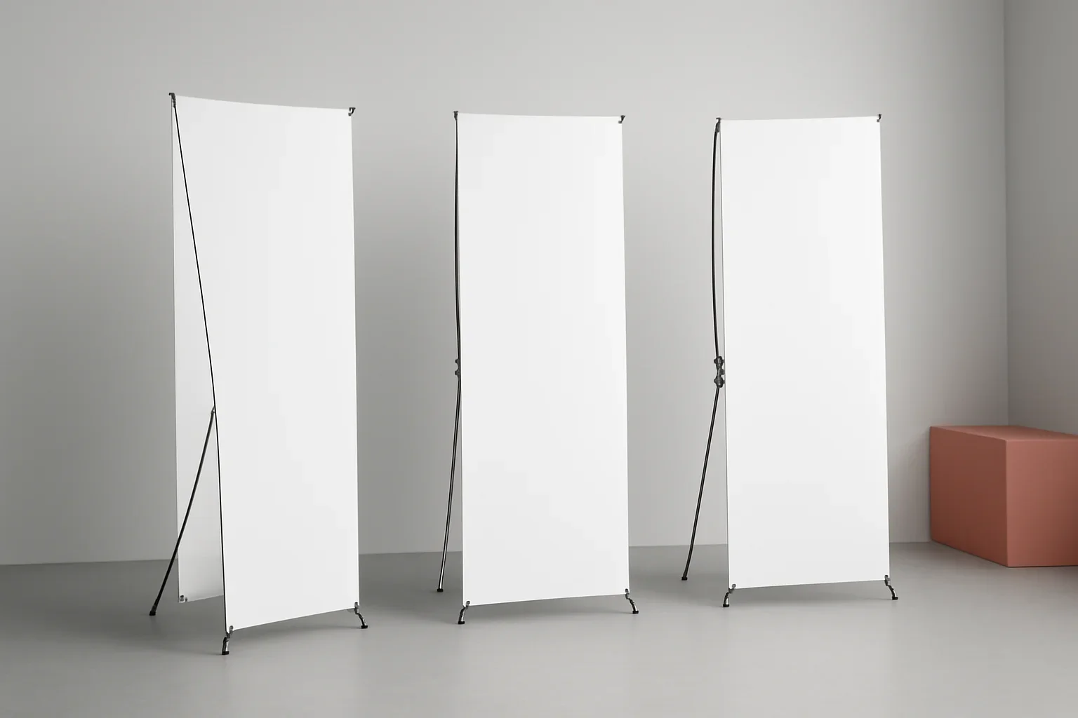 X Banner Stands presented in a clean promotional setting